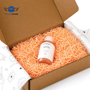 Shredded paper filler inside an open gift box